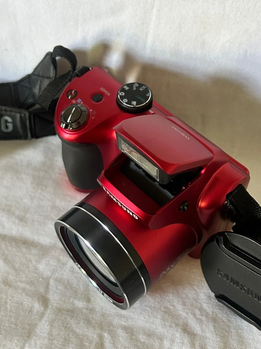 Samsung WB100 Red Digital Camera with Built-in Flash and Strap